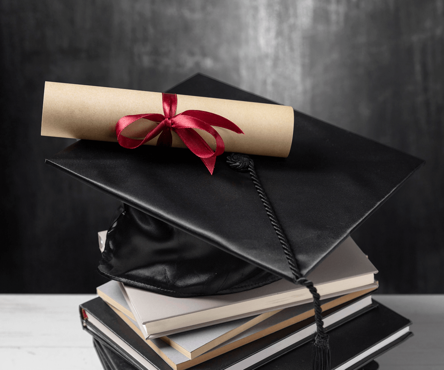 stack-books-with-gradution-diploma